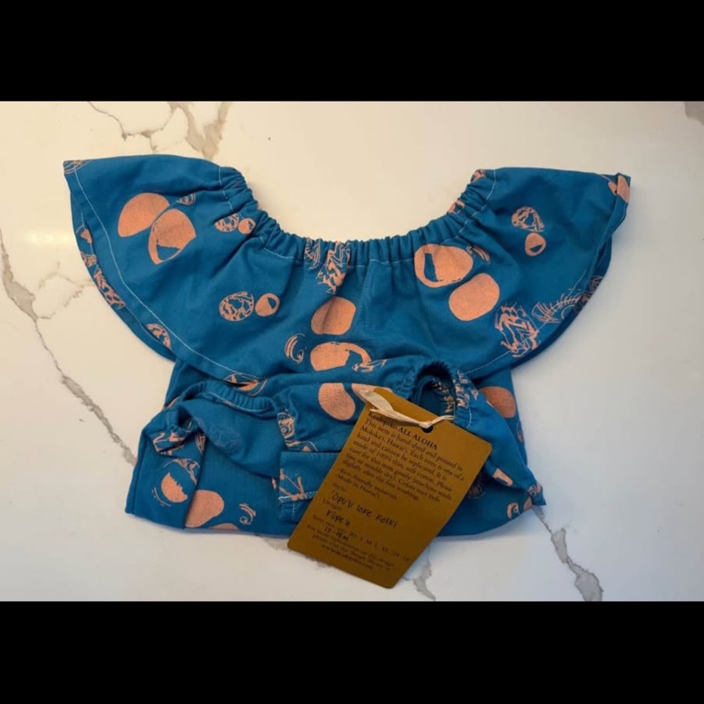 Three Piko Kealopiko Kids onesie